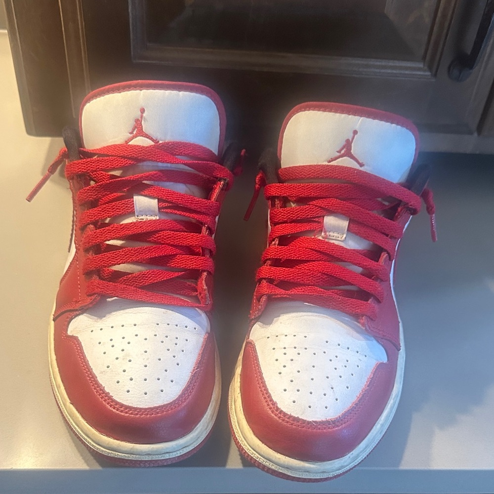 Women’s red and white shoes